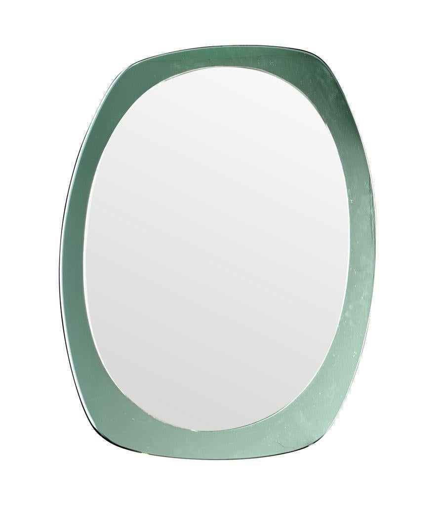 An Italian 1960s Cristal Arte oval mirror with mint green mirrored frame For Sale 6