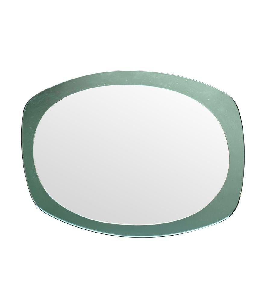 An Italian 1960s Cristal Arte oval mirror with mint green mirrored frame For Sale 4