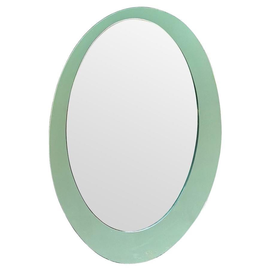 Miroir ovale italien Cristal Arte des années 1960 avec cadre en miroir vert menthe pastel. en vente