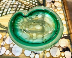 An Italian 1960s green Murano glass ashtray / bowl
