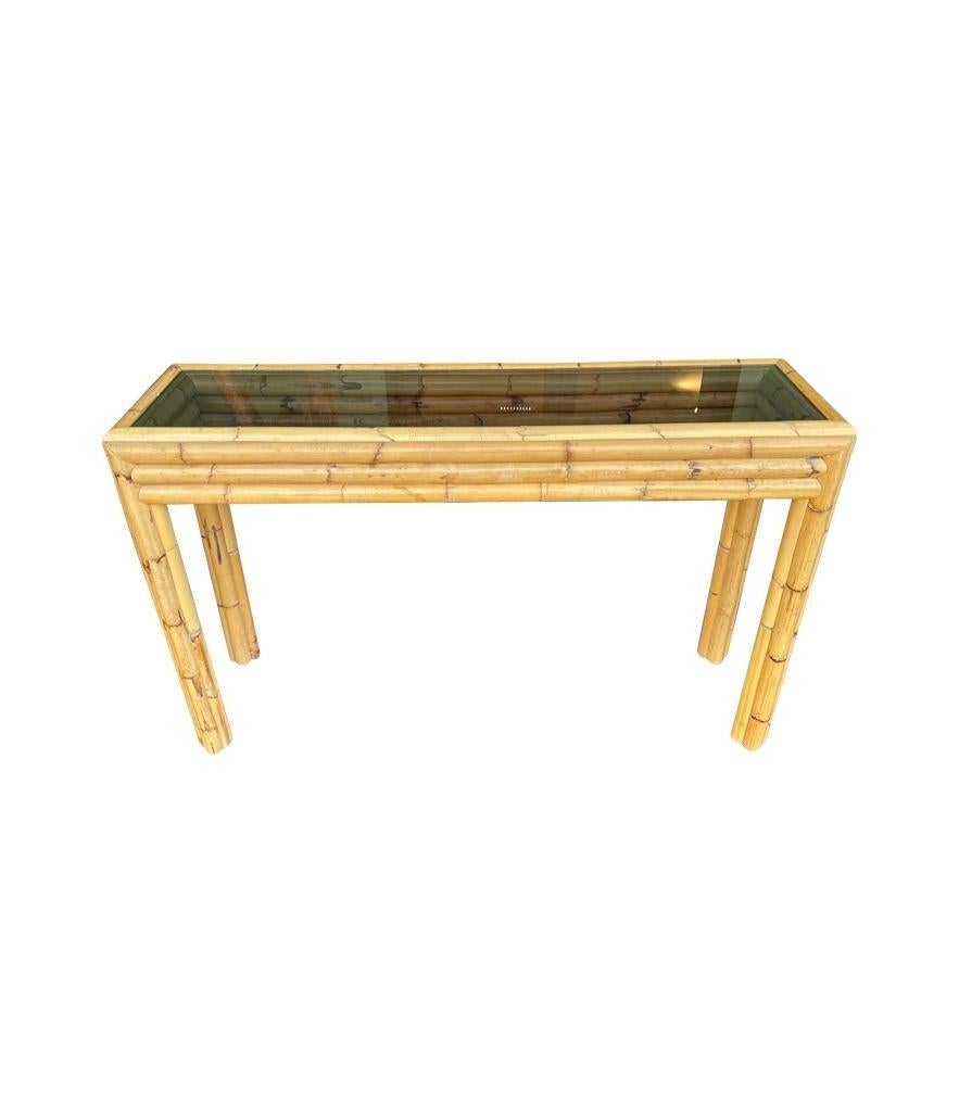 Bamboo An Italian 1970s bamboo console with smoked glass attributed to Vivai Del Sud For Sale