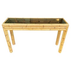 An Italian 1970s bamboo console with smoked glass attributed to Vivai Del Sud