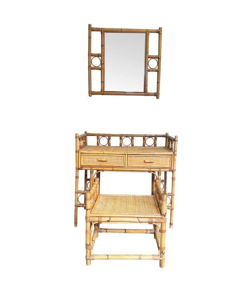 An Italian 1970s bamboo and rattan dressing table set with two drawer dressing table, stool and mirror.
Dimensions:
Dressing table 90.5cm wide x 42cm deep x 86cm high / Height of desk top 70cm
Stool 53cm wide x 36cm deep x 51cm high Seat height