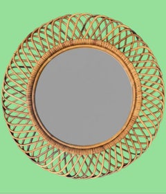 An Italian 1970s circular woven bamboo mirror by Franco Albini for Bonacina