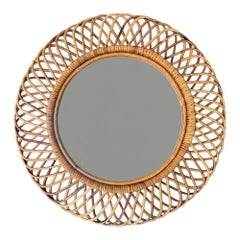 An Italian 1970s circular woven bamboo mirror by Franco Albini for Bonacina
