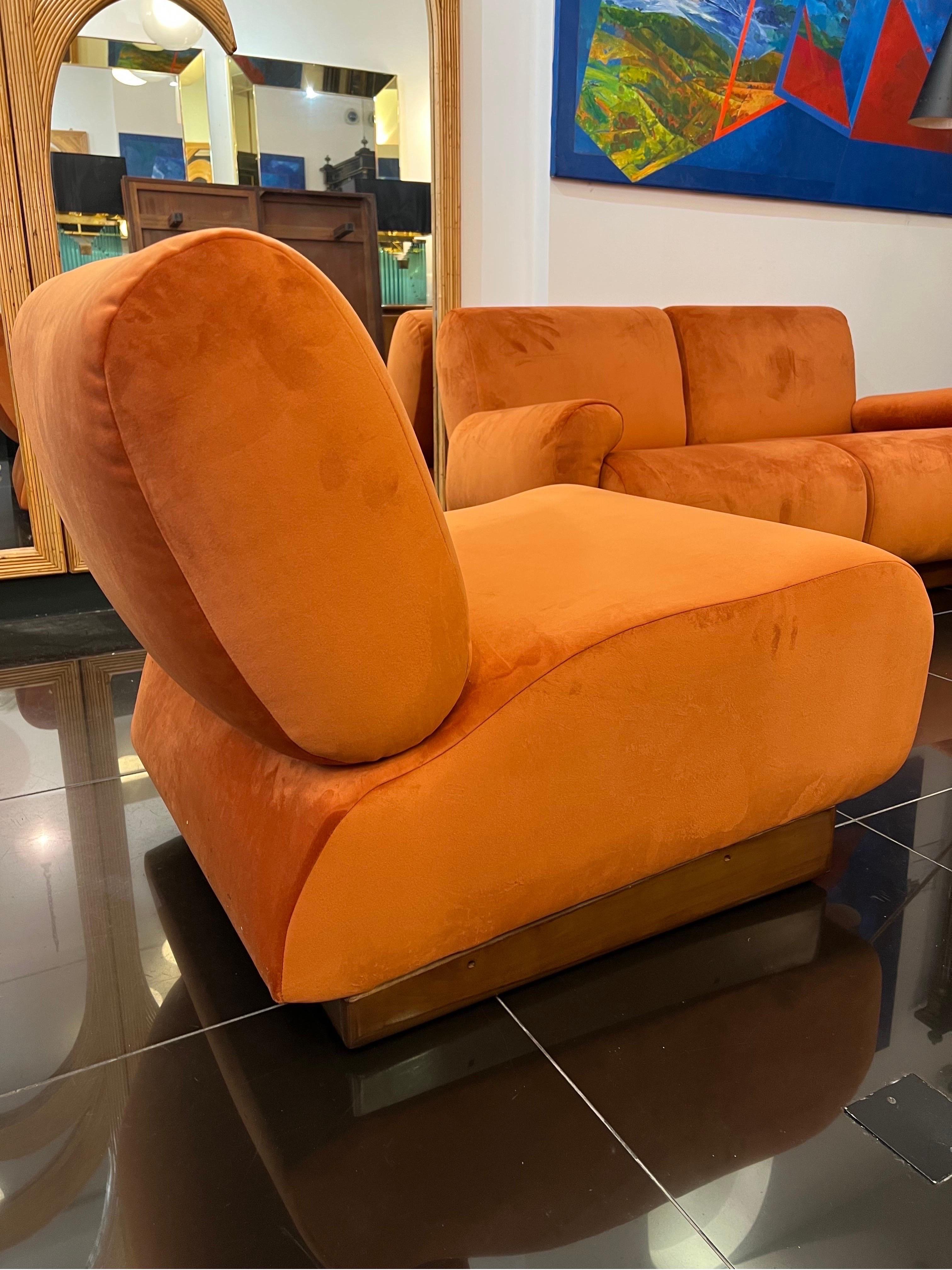 An Italian 1970s Large 4 seater sectional sofa in burnt orange velvet 1