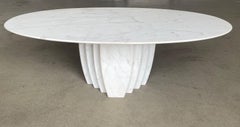 An Italian 1970s oval marble coffee table in the style of Angelo Mangiarotti