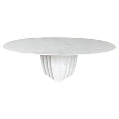 An Italian 1970s oval marble coffee table in the style of Angelo Mangiarotti