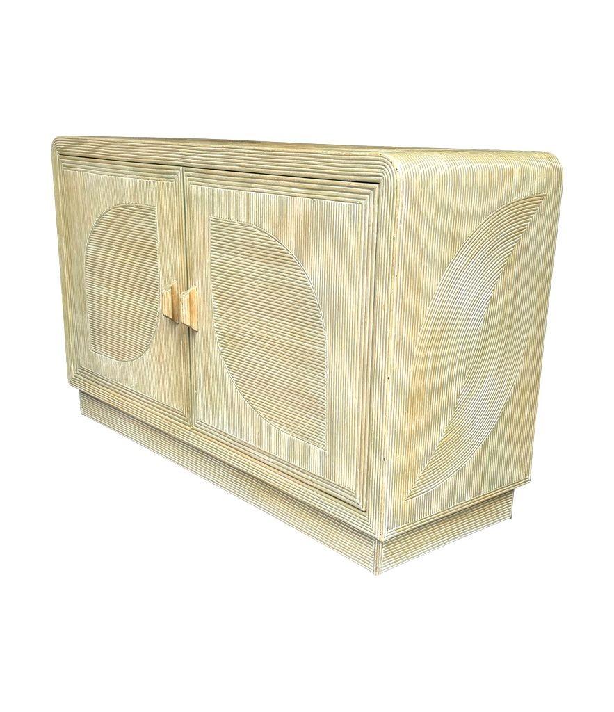 Italiano An Italian 1970s pencil reed bamboo, two doors, cabinet by Vivai Del Sud in vendita
