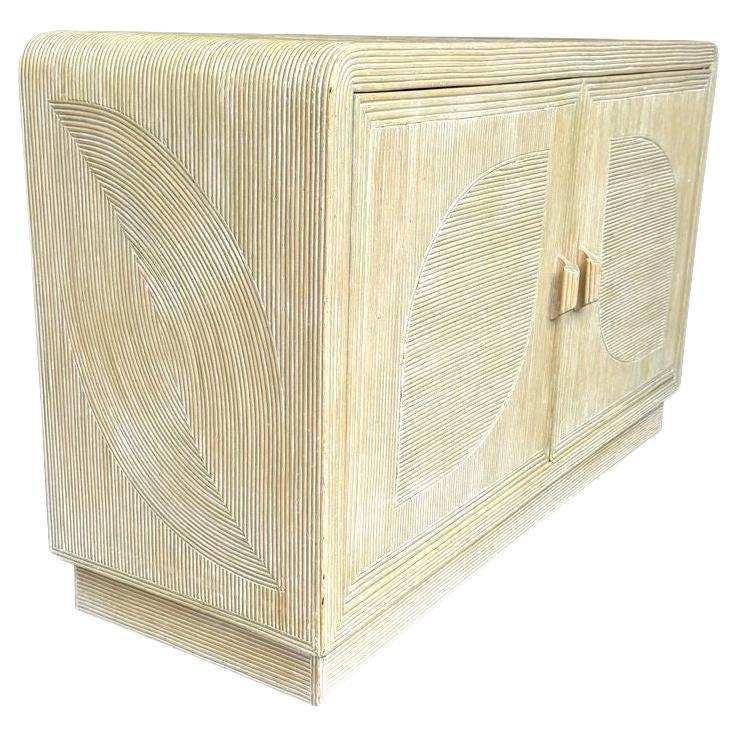 An Italian 1970s pencil reed bamboo, two doors, cabinet by Vivai Del Sud