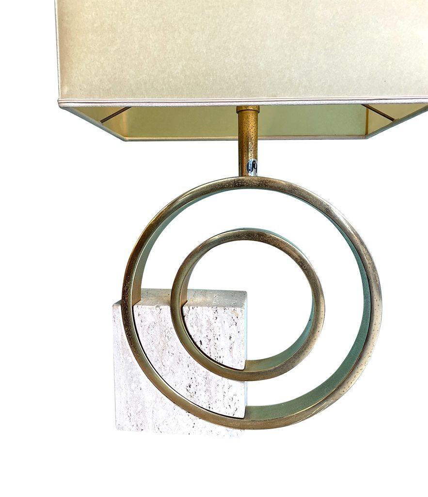 An Italian 1970s sculptural travertine and brass lamp by Giovanni Banci For Sale 1