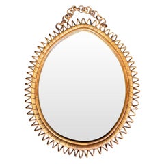 An Italian 1970s teardrop shaped bamboo mirror by Franco Albini