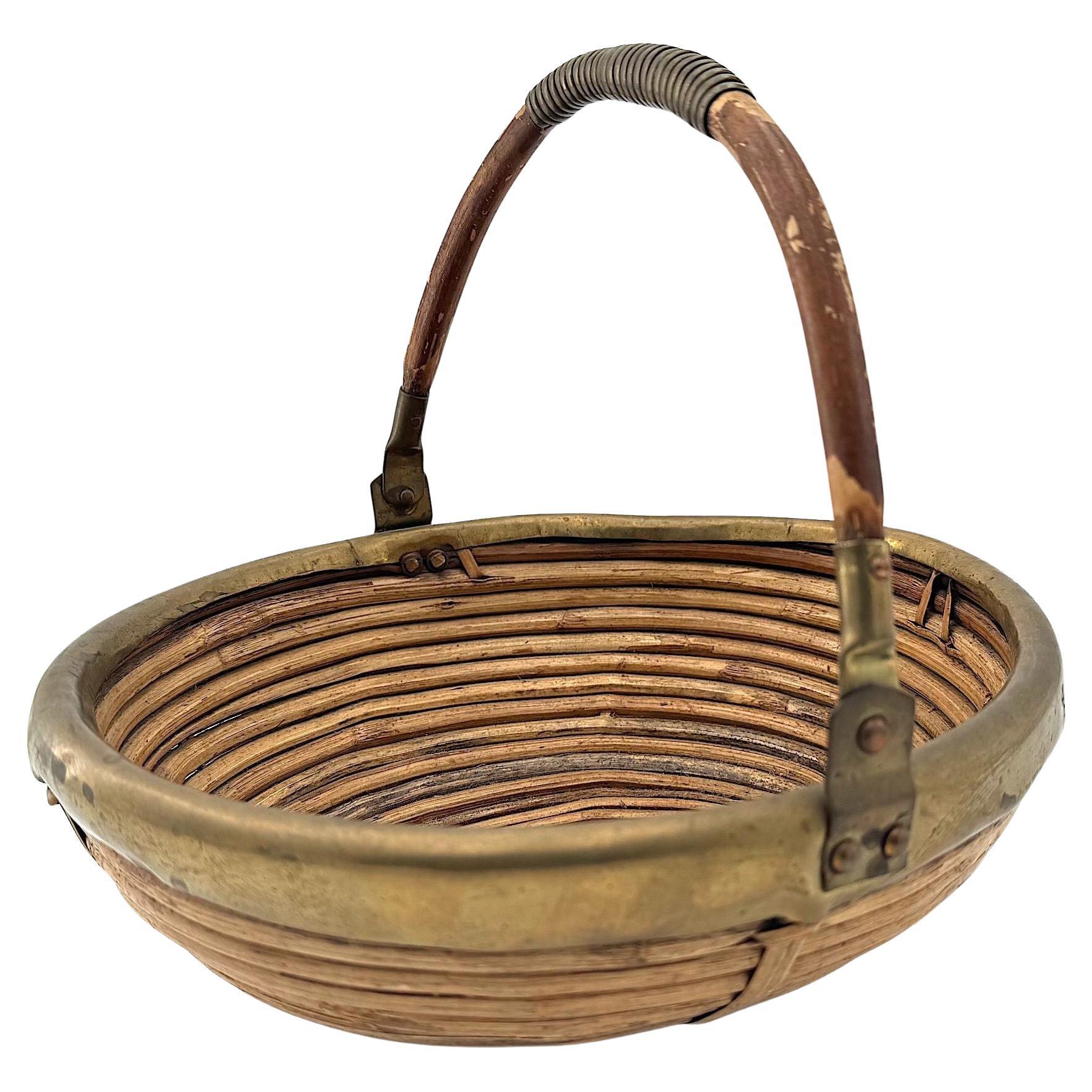 An Italian 1970s woven bamboo and brass bowl in the style of Gabriella Crespi