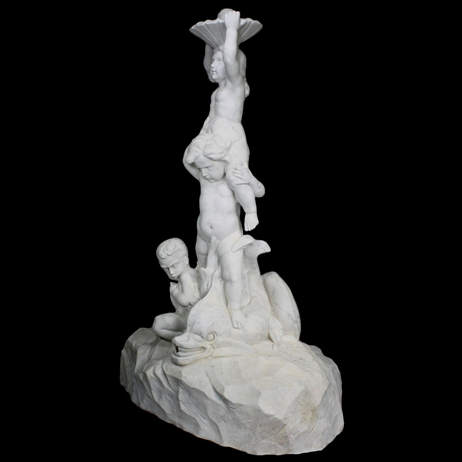 Belle Époque An Italian 19th/20th Century Carved Marble Figural Fountain with Children & Fish For Sale