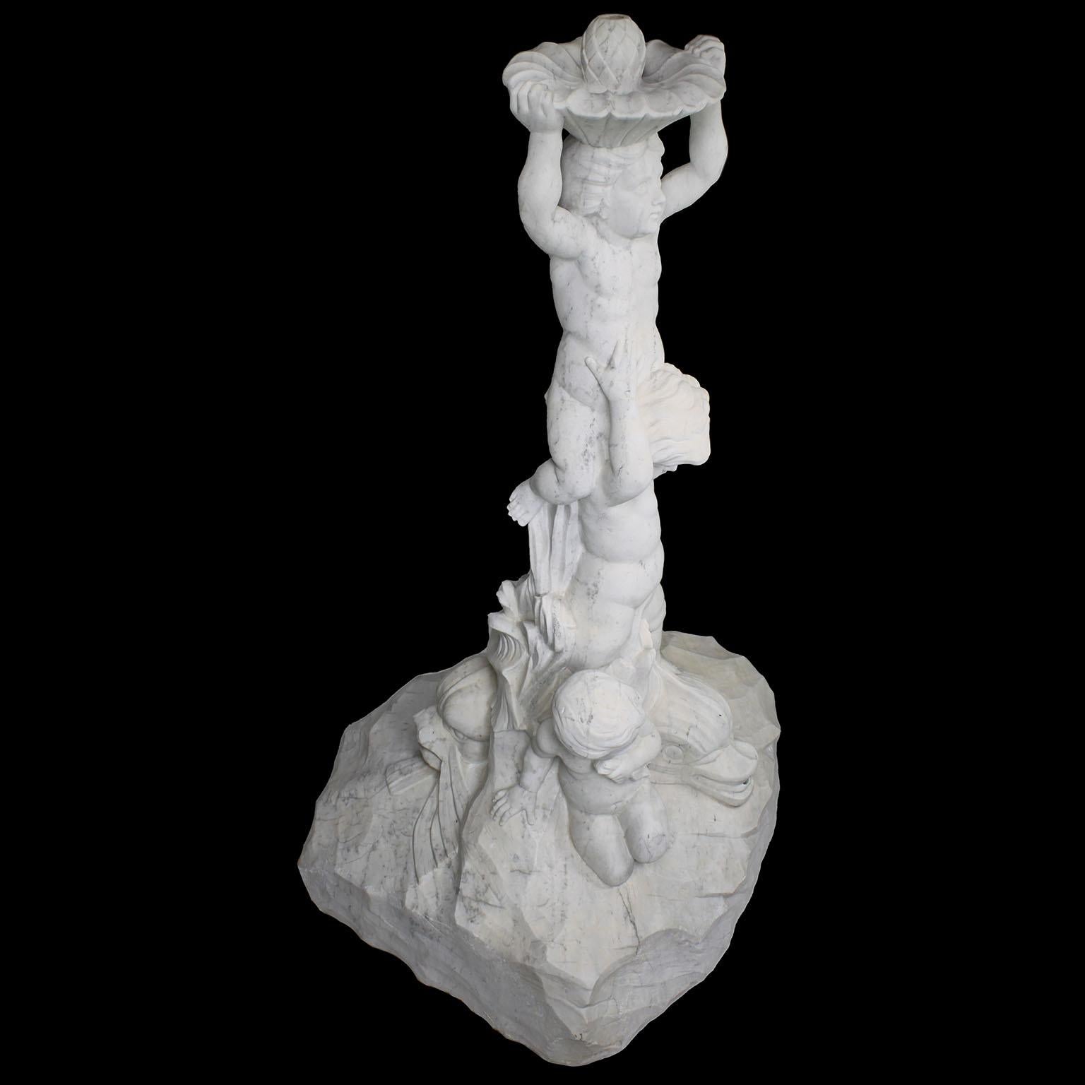 Hand-Carved An Italian 19th/20th Century Carved Marble Figural Fountain with Children & Fish For Sale