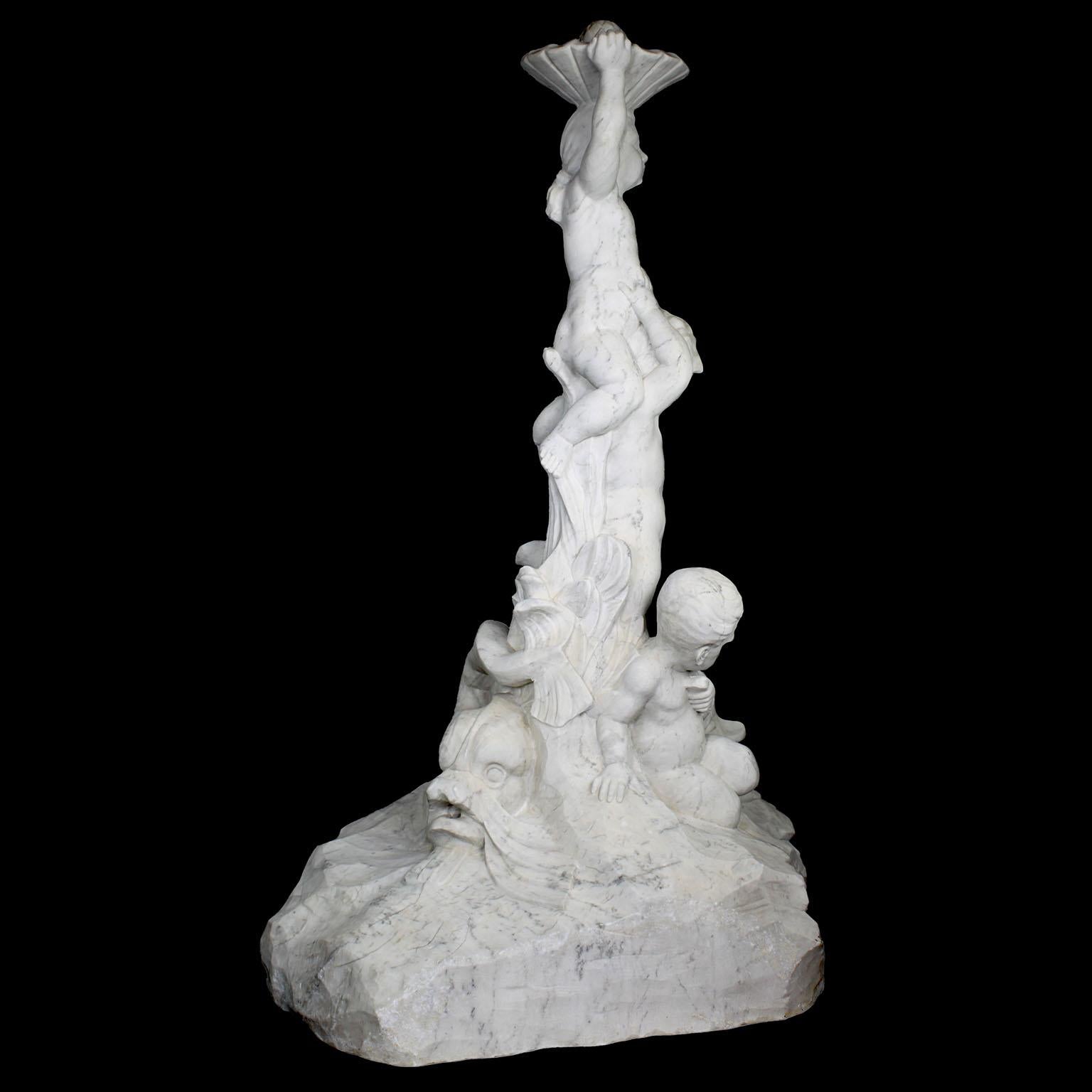 An Italian 19th/20th Century Carved Marble Figural Fountain with Children & Fish In Good Condition For Sale In Los Angeles, CA