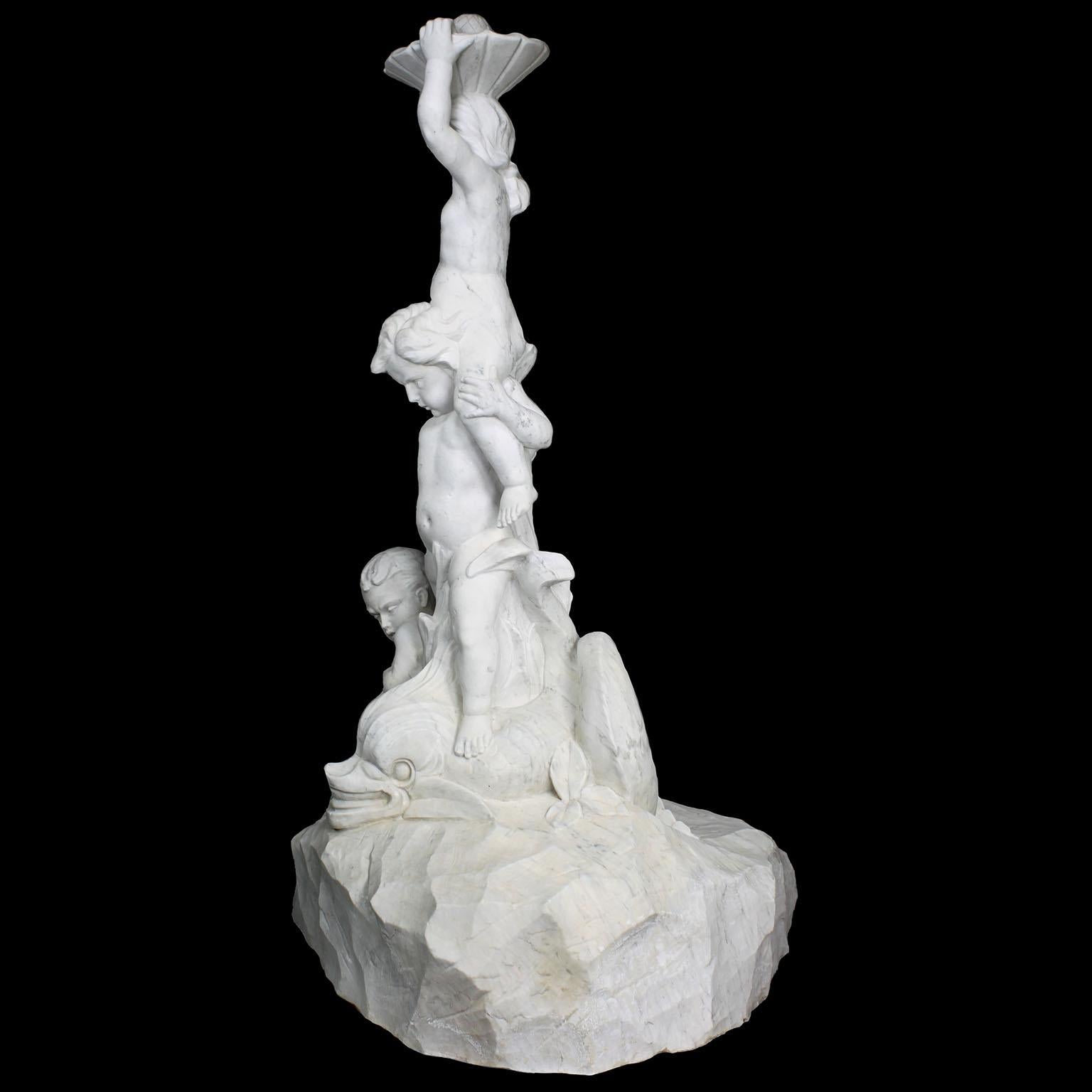 Early 20th Century An Italian 19th/20th Century Carved Marble Figural Fountain with Children & Fish For Sale