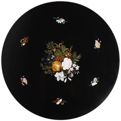 An Italian 19th Century Florentine Pietra Dura Inlaid Table on a Giltwood Stand