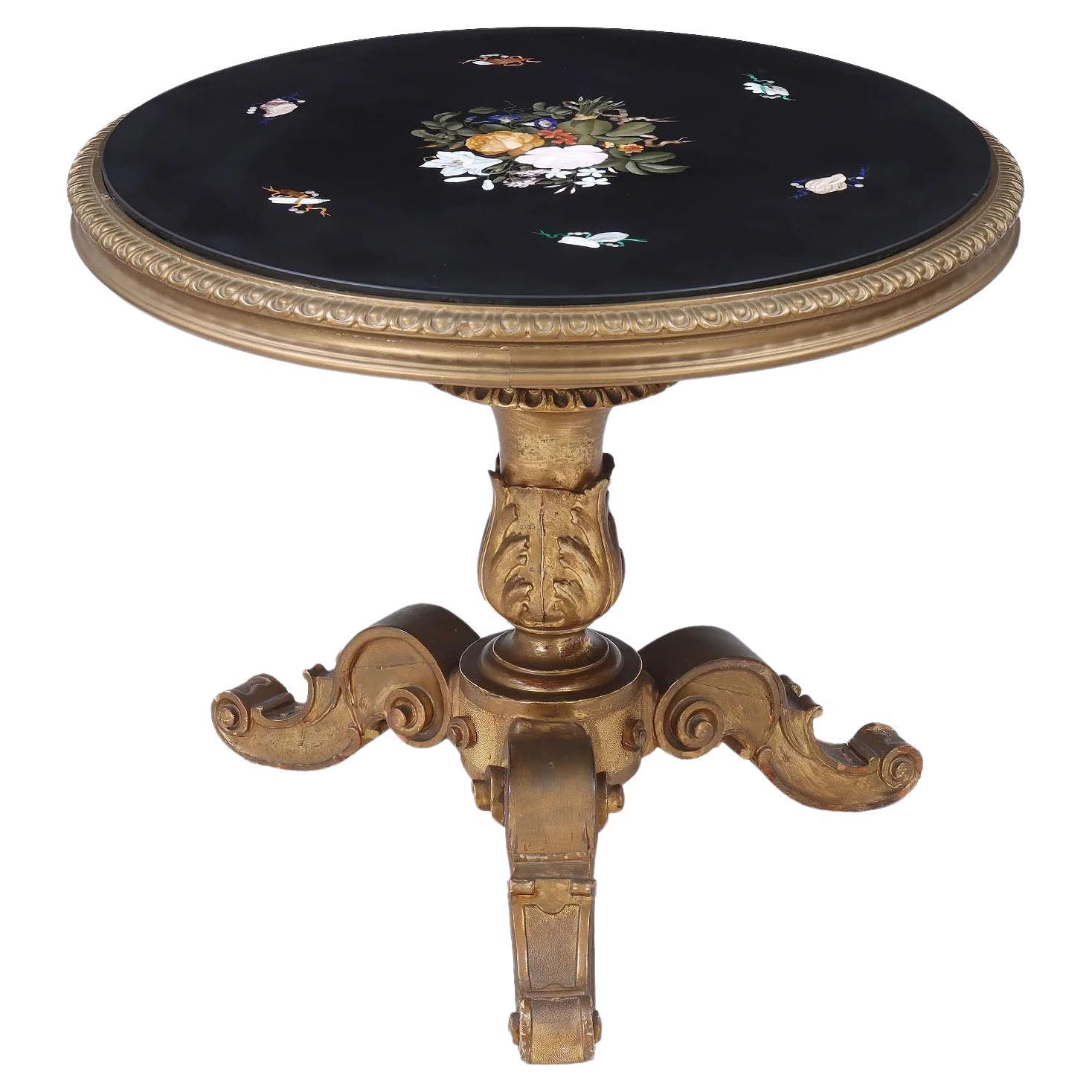 An Italian 19th Century Florentine Pietra Dura Inlaid Table on a Giltwood Stand
