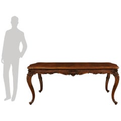 An Italian 19th century Louis XV st. Burl Walnut dining/center table