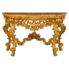 An Italian 19th century Louis XV st. Giltwood and Breche D’Alep marble console