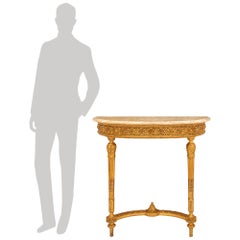 An Italian 19th century Louis XVI st. Giltwood and Jaune du Jura marble console