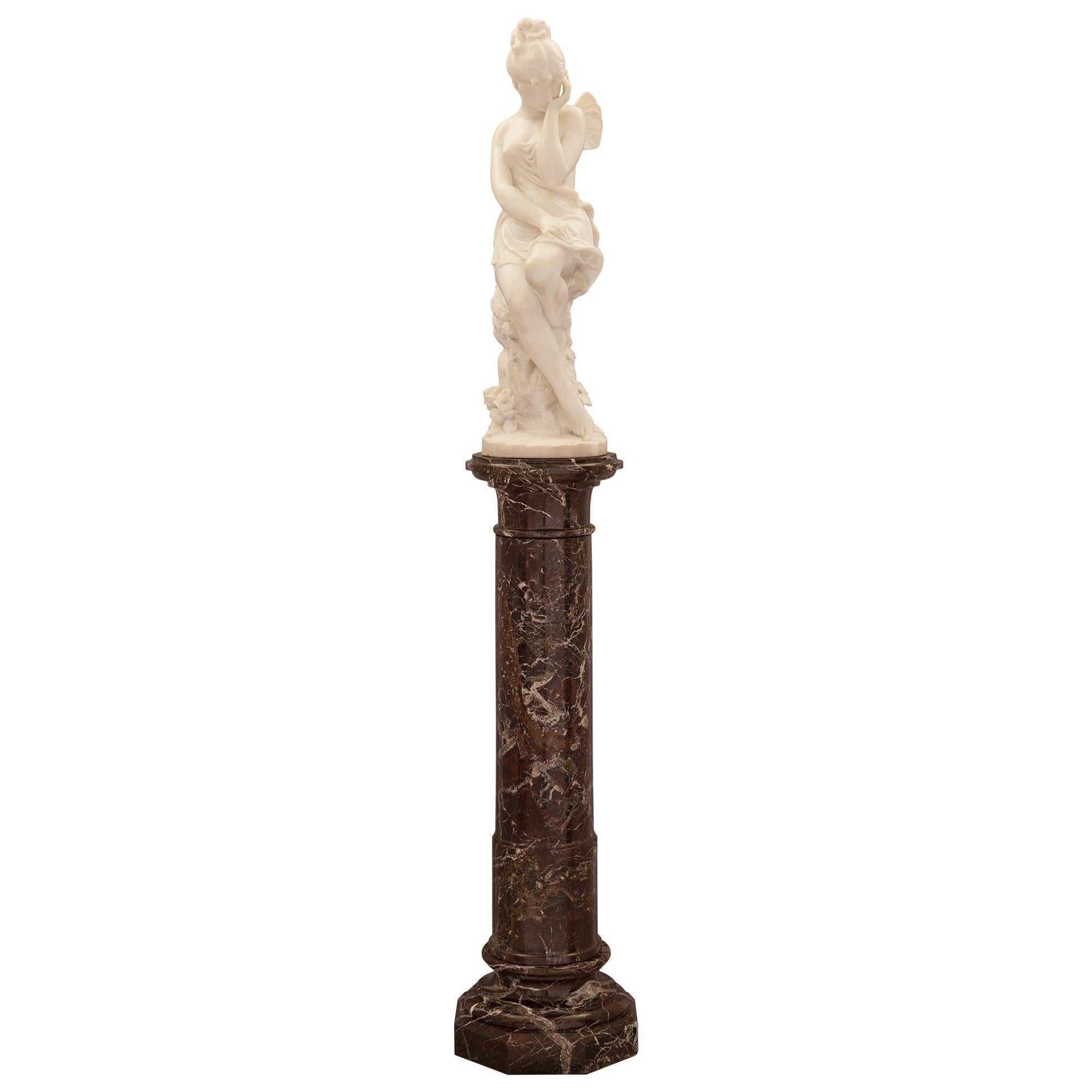 A stunning and very high quality Italian 19th century white Carrara marble statue title Psyche Abandoned on her original Rosso Levanto marble pedestal. The Rosso Levanto column is raised by an octagonal base with a fine circular socle shaped support