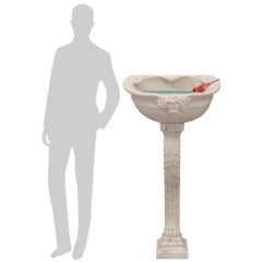 An Italian 19th century Neo-Classical st Carrara marble bird bath/sink