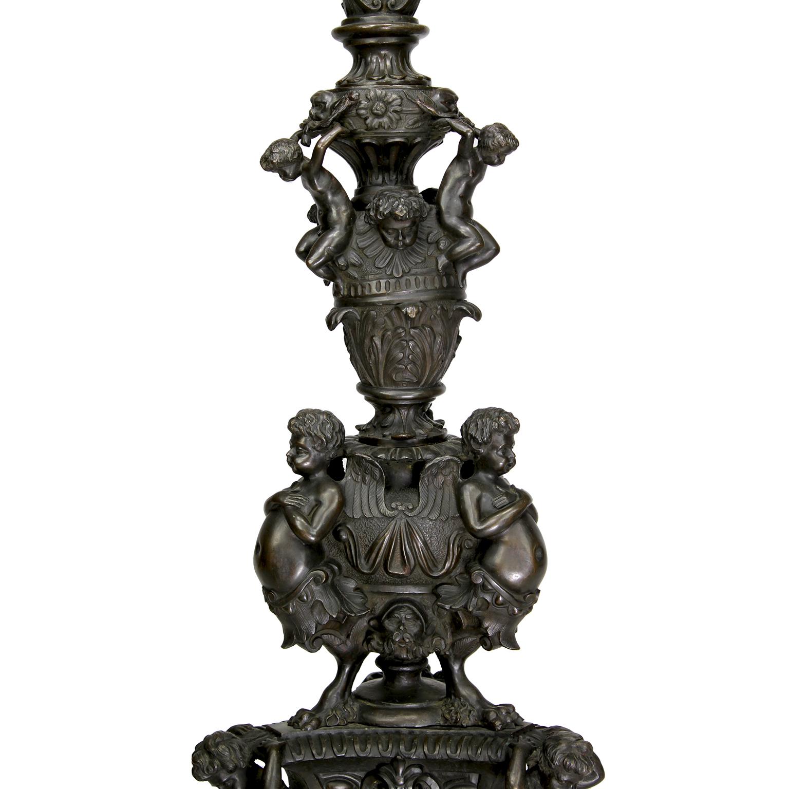 An Italian 19th Century Patinated Bronze Torchere, After Niccolò Roccatagliata In Fair Condition For Sale In Los Angeles, CA