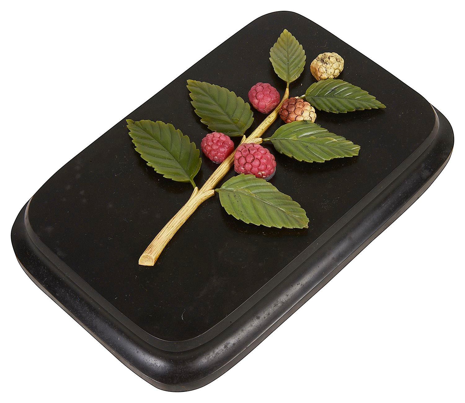 A good quality 19th Century Russian pietra dure plaque / paper weight with a hand carved fruiting raspberry branch on black stone plinth
Batch 70 61663  ANKZ