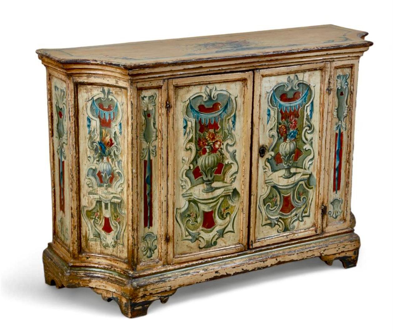 Striking late 17th/Early 18th Century Italian Baroque style polychrome painted credenza. Credenza embodies the opulence and ornate characteristics of the Baroque period. It has rich color palette with vibrant painted scenes featuring urns, flowers,
