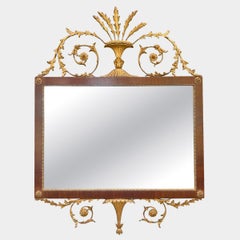 An Italian Baroque Style Carved And Gilt Mirror