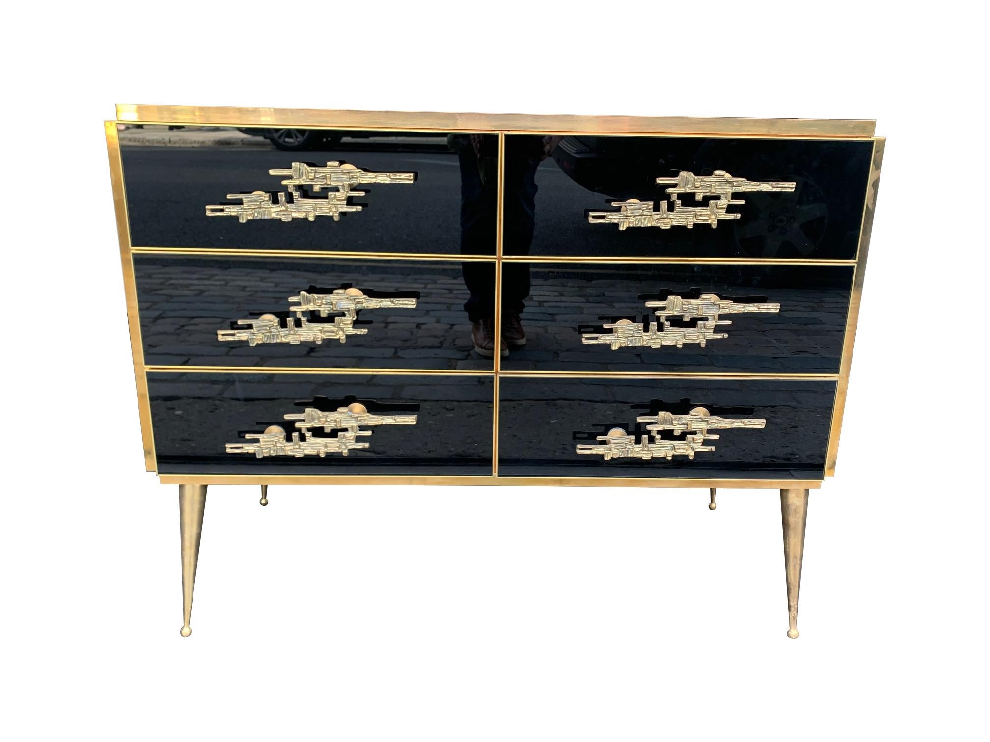 Mid-Century Modern Italian Black Glass and Brass Chest of Drawers with Brutalist Brass Handles