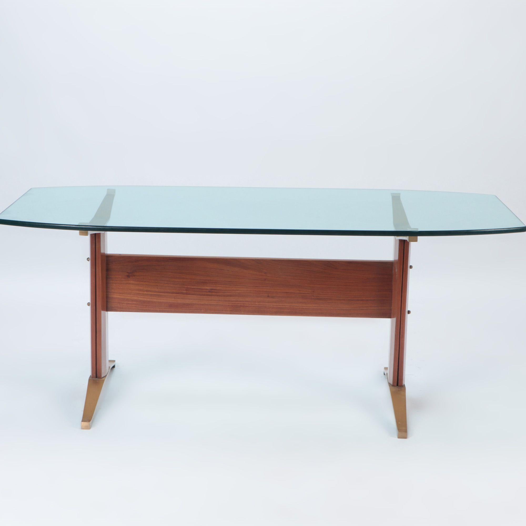 An Italian brass and wood writing desk or dining table with glass top, C 1955.