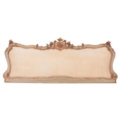 Vintage An Italian carved and painted giltwood King size headboard circa 1900.