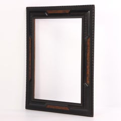 An Italian carved frame in the Dutch style, C, 1940.