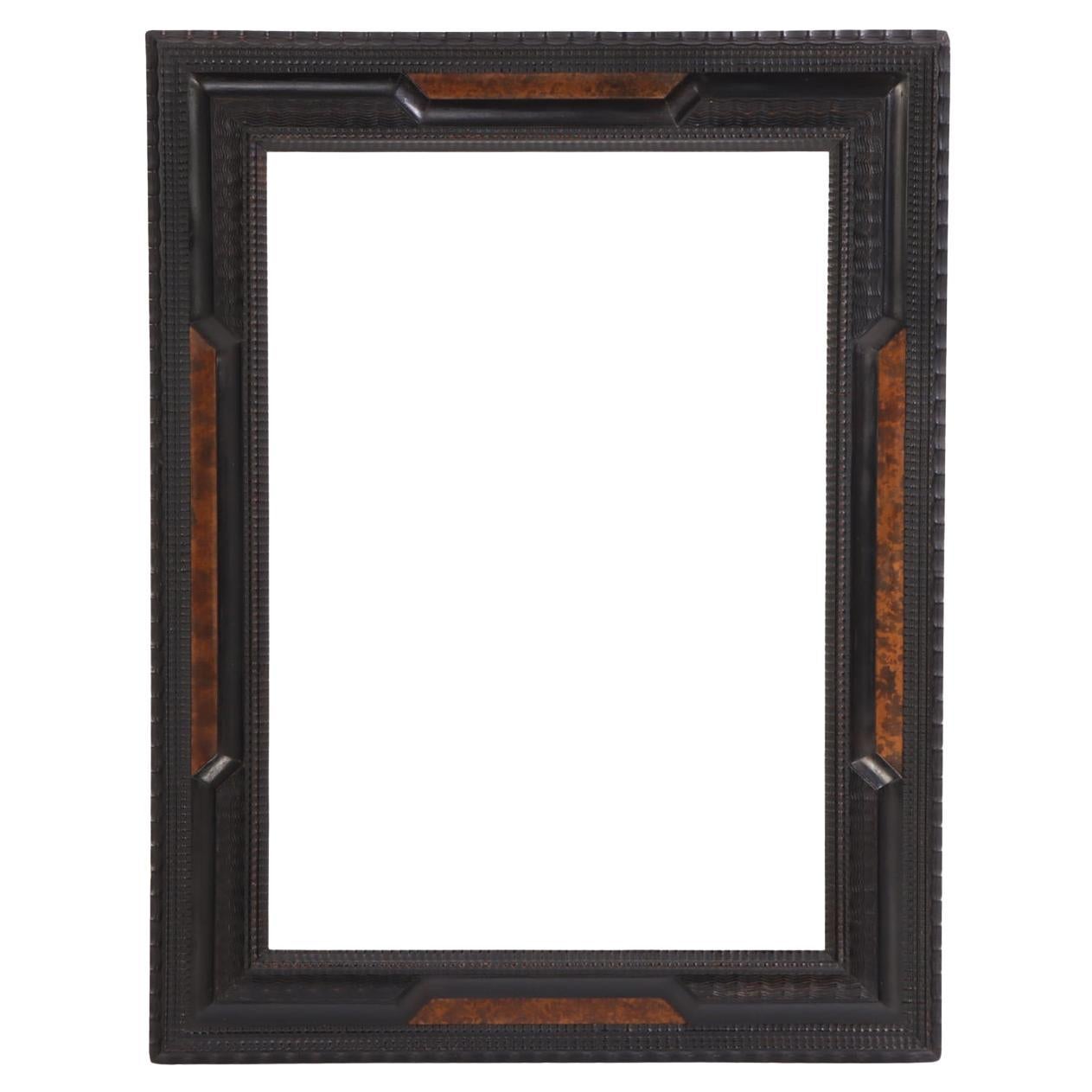 An Italian carved frame in the Dutch style, C, 1940. For Sale