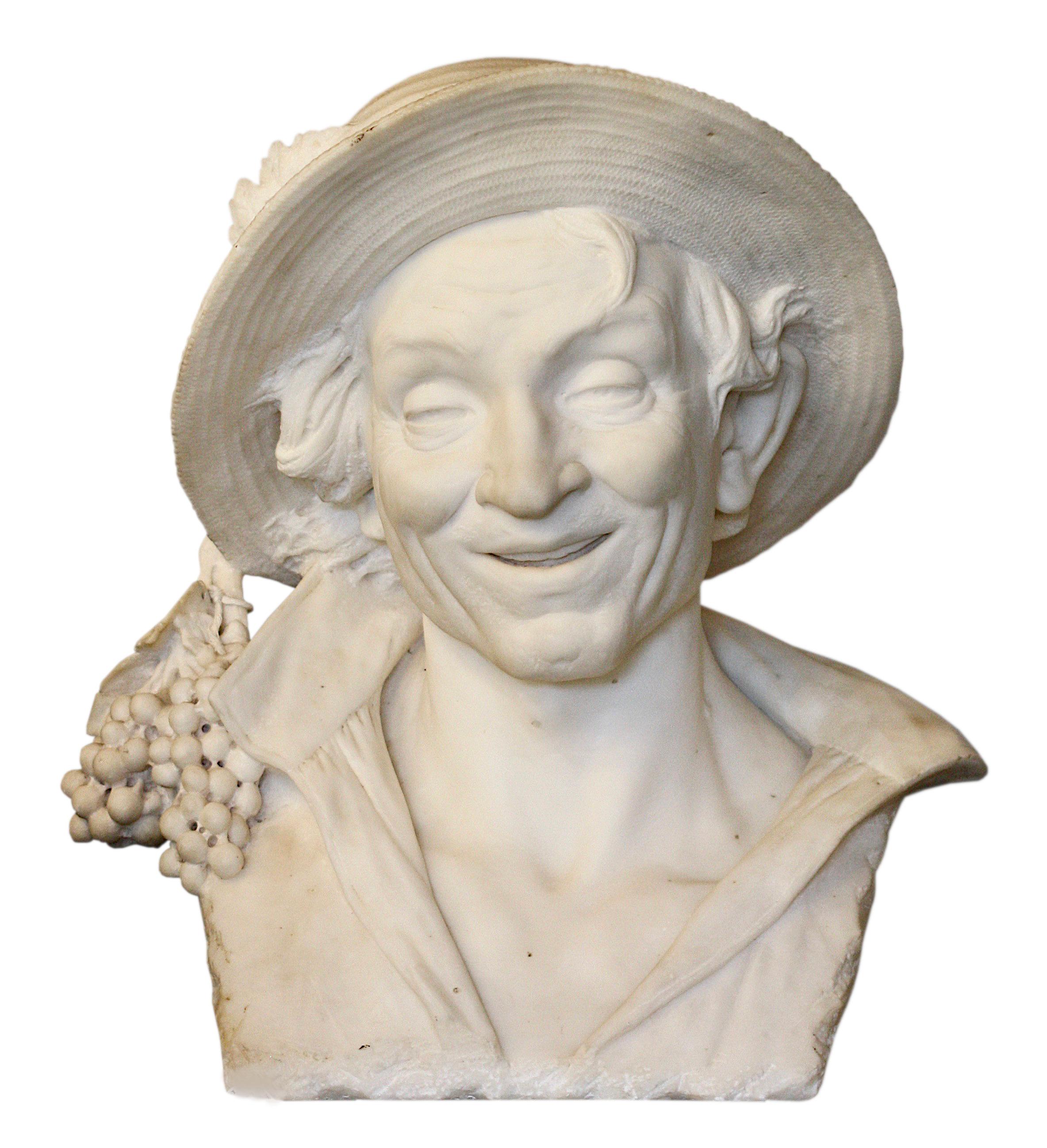 An Italian carved white marble bust
Finely carved, depicted is an inebriated jolly Man wearing an open shirt with grapes hanging from his straw hat
Measures: height 20 in. (50.8 cm.) 
Width 17 in. (43.12 cm.) 
Depth 12 in. (30.48 cm.)