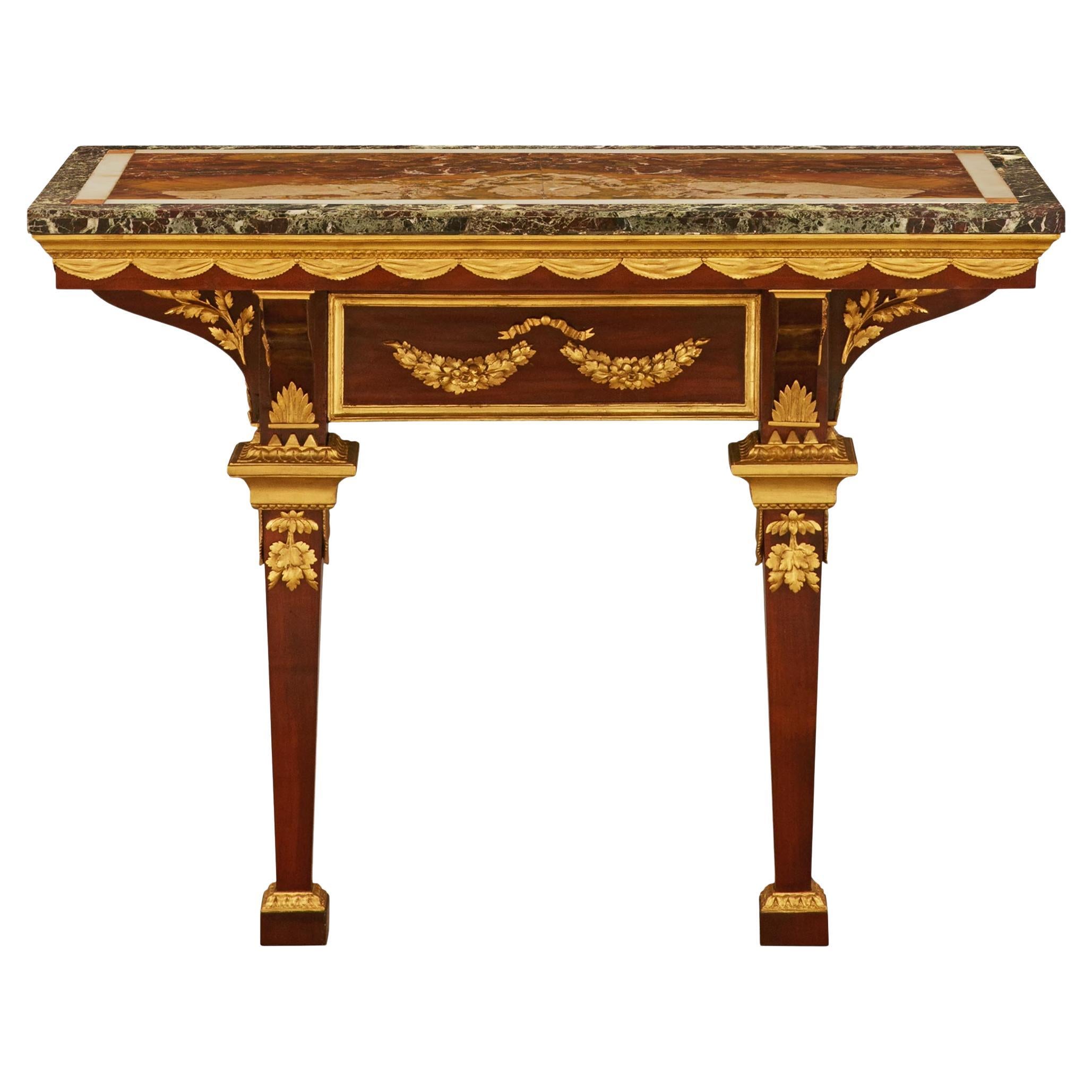 Eine italienische Konsole aus Mahagoni, vergoldetem Holz und furniertem Marmor aus dem frühen 19. Jahrhundert