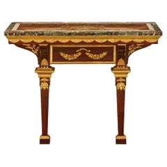 An Italian early 19th century Mahogany, Giltwood and veneered marble console