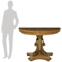 An Italian early 19th century Neo-Classical st. patinated and Giltwood console