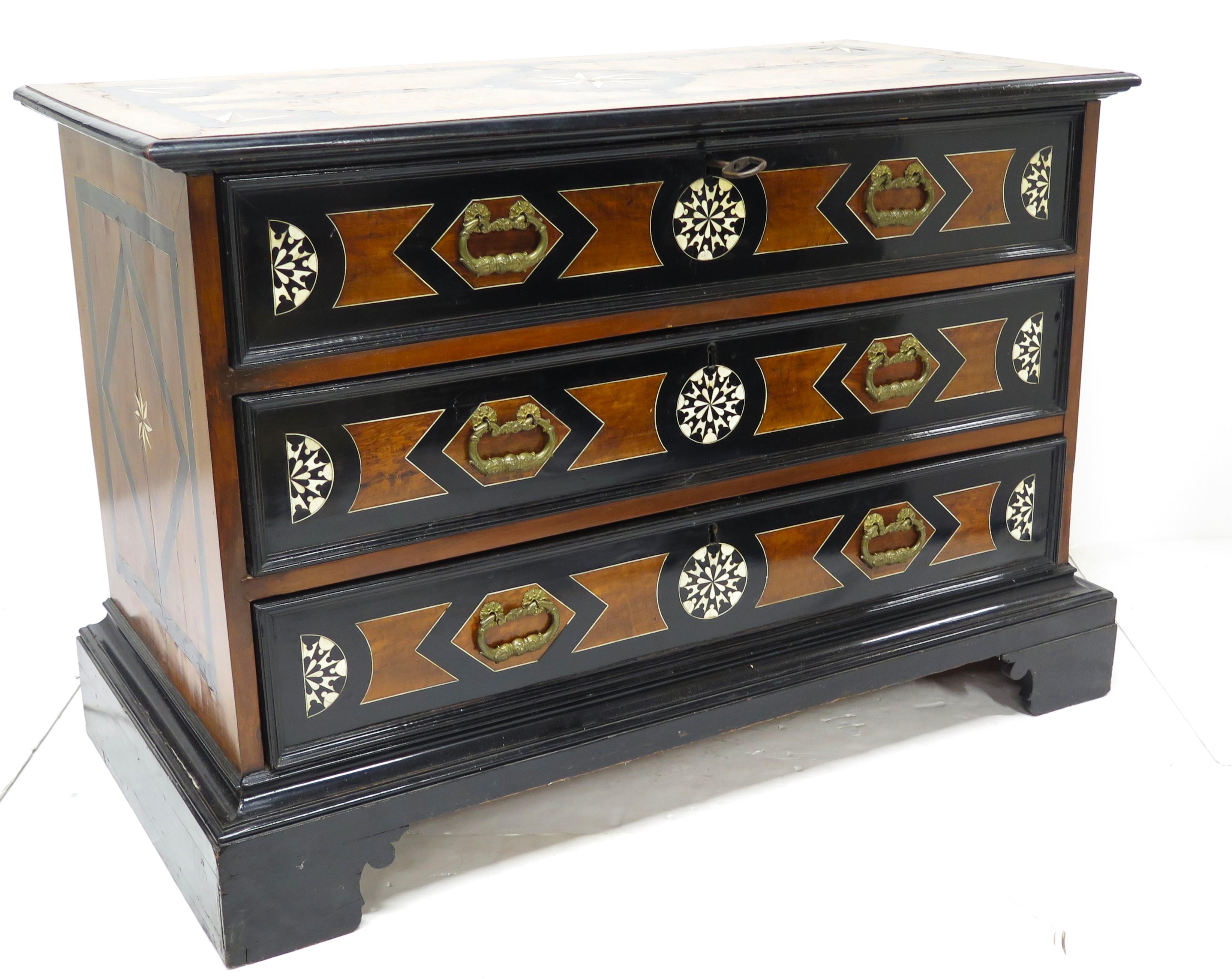 Neoclassical An Italian Ebonized Fruitwood and Bone Inlaid Three Drawer Commode For Sale