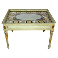 An Italian Eglomise Painted Glass Top and painted/Gilt wood Coffee Table