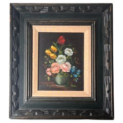 An Italian floral still life oil painting by L. Ruggeri, 20th century
