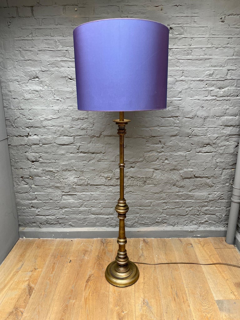 A tall brass floor lamp by Italian lighting designer Gaetano Sciolari. Stamped and marked at base, with 4 separate light fittings. Can be re- wired for any country, has an original shade which will be included, although we suggest replacing. Height