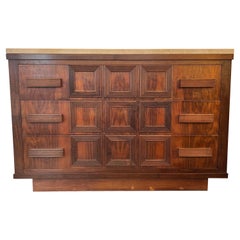 An Italian Geometric design 3 drawers commode with travertine top .