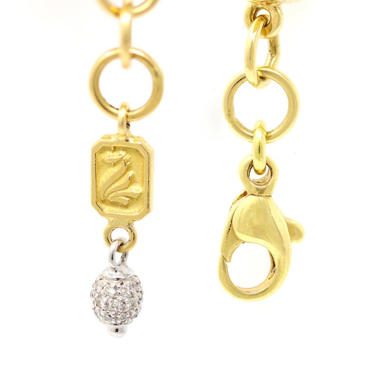 An Italian Hammered Gold Beads Bracelet with diamonds 18k For Sale at