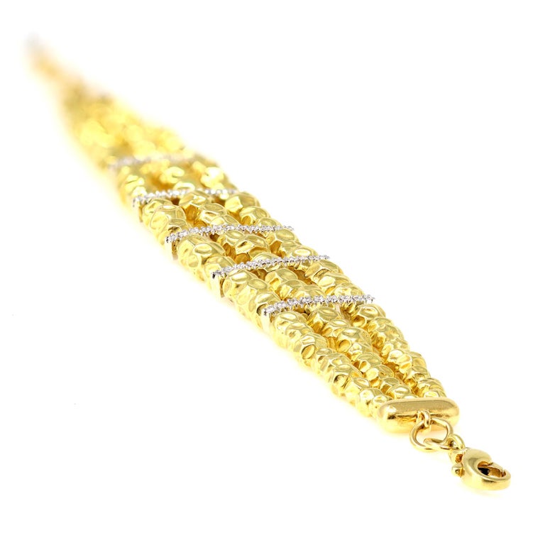 An Italian Hammered Gold Beads Bracelet with diamonds 18k For Sale at