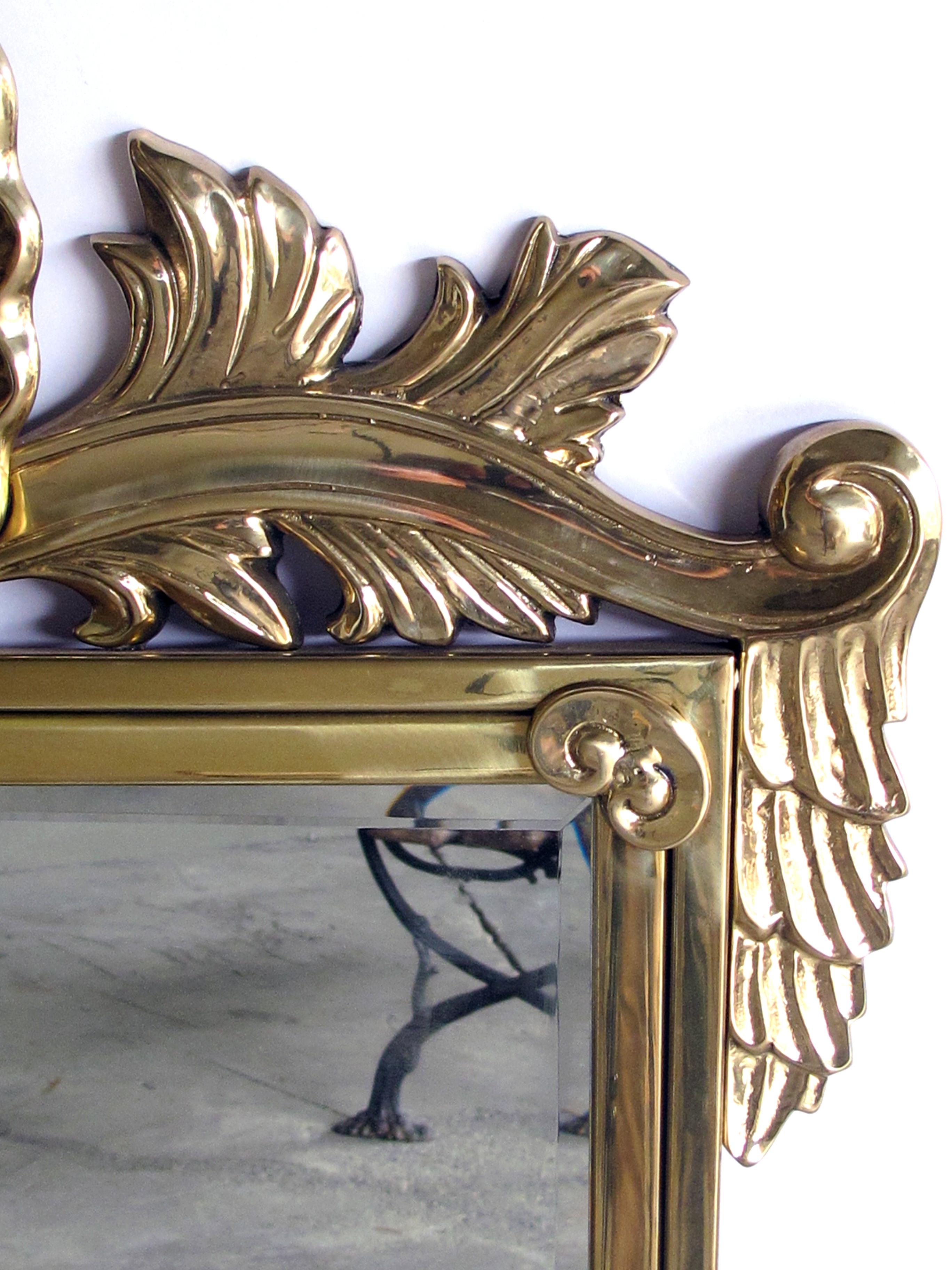 Molded An Italian Hollywood Regency Solid Brass Mirror with Over-scaled Shell Crest For Sale