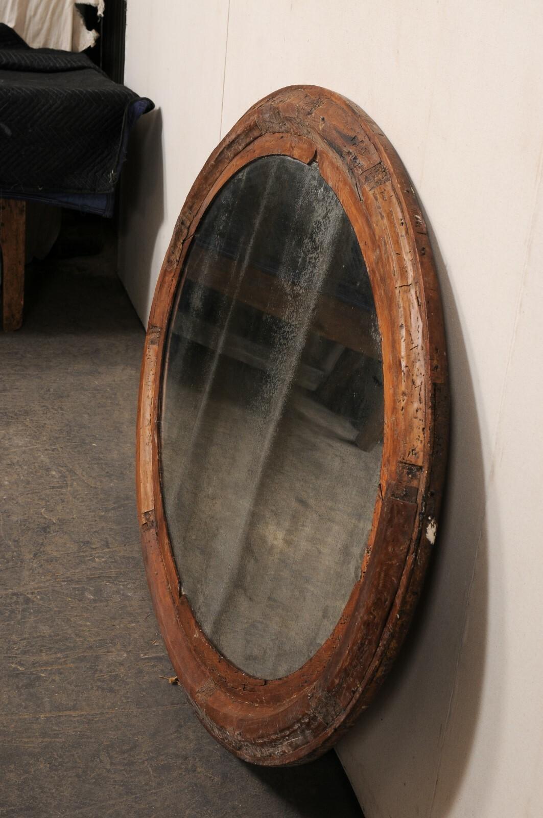 20th Century An Italian Large-Sized Oval Mirror, Early 20th C. For Sale